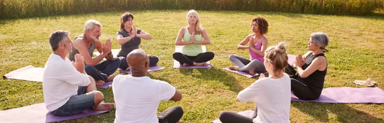 group of people doing yoga